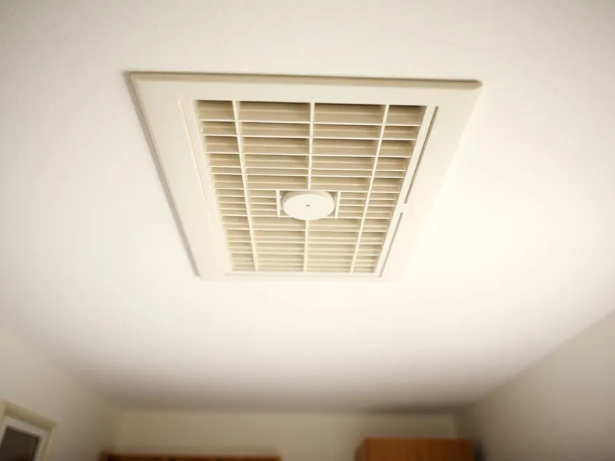 Ceiling supply vent in an upstairs bedroom
